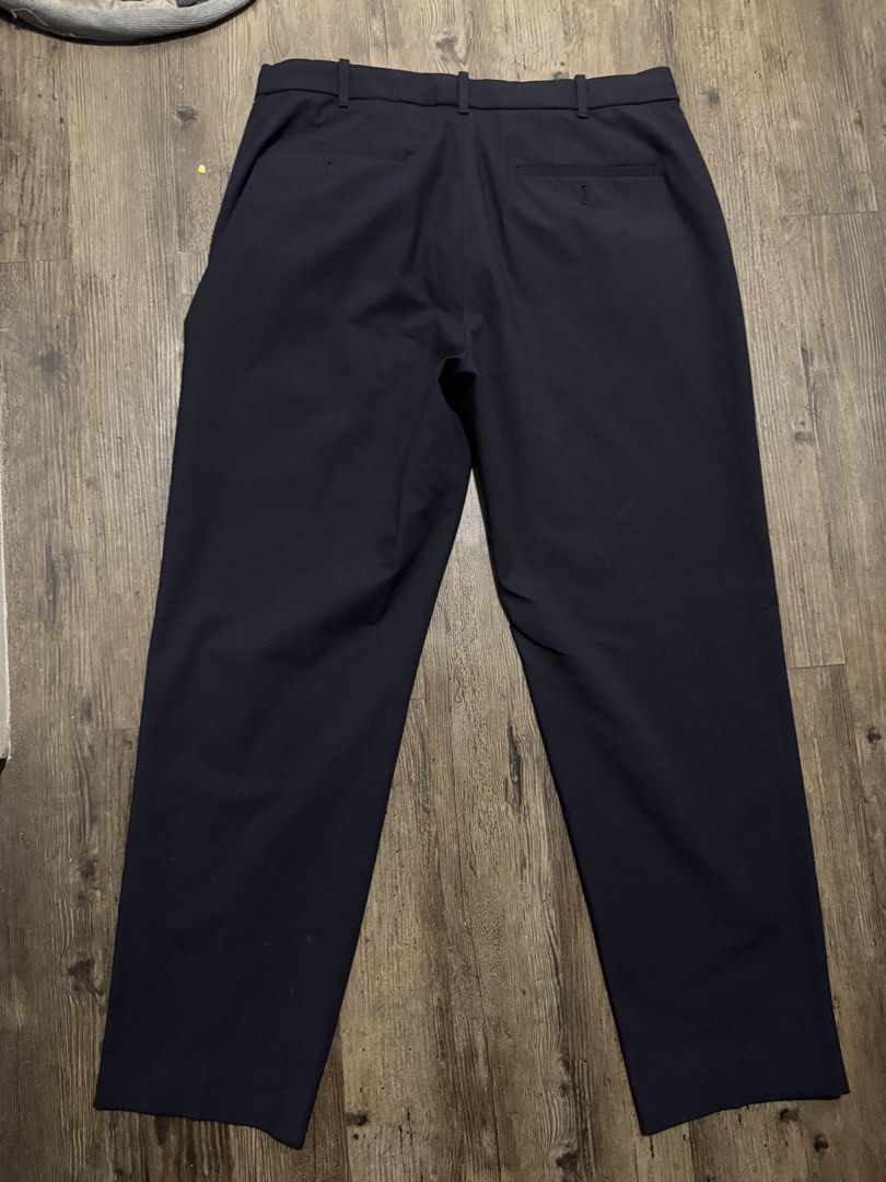 Uniqlo Navy Blue Formal Pants (Category: Trousers) located in Taguig. Submitted by rdeclutter1 (Listing ID 1462747055, Image 2). Description: Uniqlo Navy Blue Formal Pants (forgot the exact Uniqlo name) Size: L; 84-92cm (33-36 inches) Dimensions: Length 39in, Waist 35in Shipping from BGC.