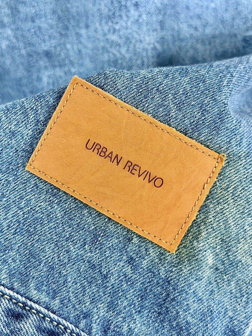 URBAN REVIVO Cropped Denim Jacket (Category: Coats, Jackets and Outerwear) located in Cavite. Submitted by jauzjauz (Listing ID 1462780295, Image 3). Description: DIMENSIONS: 21x27 LIKE NEW Small on Tag (Unisex Fit) NO ISSUE - Classic blue denim jacket from URBAN REVIVO - Button-up front with chest pockets - Relaxed fit, great for layering - Made in China - Refer to label for care instructions.