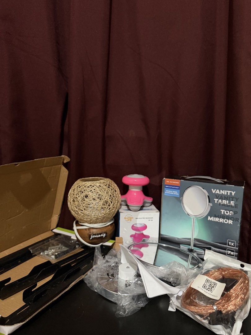 Vanity Mirror, Mini Massager, String Lights & More (Category: Mirrors) located in Caloocan City. Submitted by rohllee (Listing ID 1462729595, Image 2). Description: - XL Vanity Table Top Mirror - Pink Mini Electric Massager - Decorative Woven Ball Lamp with Wooden Base (no bulb) - Copper Wire LED String Lights with Solar Panel (good working condition) - Tv Bracket - Ideal for personal use or as a thoughtful gift.