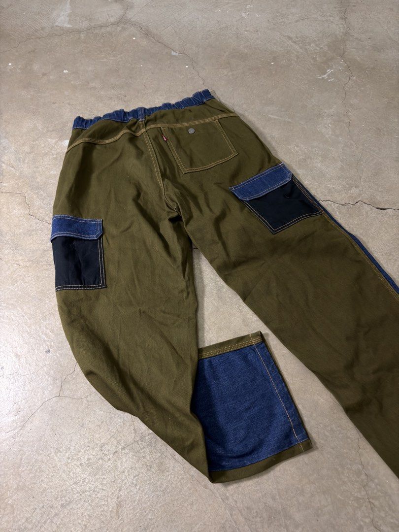 Very rare 1st proto Levi's Patchwork Denim Cargo Pants (Category: Jeans) located in Alfonso. Submitted by jbcamet (Listing ID 1462867812, Image 2). Description: - Unique Levi's patchwork pants - 1st proto of levis - Mix of denim and olive green fabric - Functional cargo pockets on the sides - Comfortable elastic waistband - Perfect for a stylish casual look.