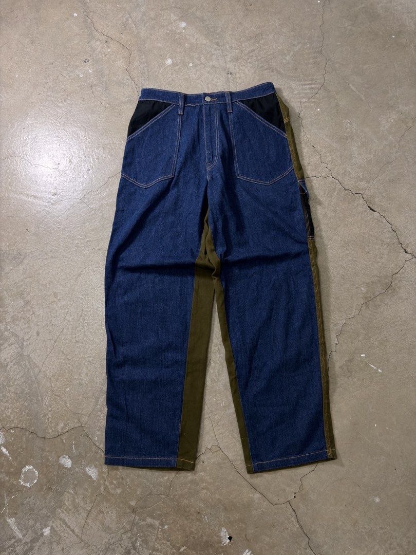 Very rare 1st proto Levi's Patchwork Denim Cargo Pants (Category: Jeans) located in Alfonso. Submitted by jbcamet (Listing ID 1462867812, Image 1). Description: - Unique Levi's patchwork pants - 1st proto of levis - Mix of denim and olive green fabric - Functional cargo pockets on the sides - Comfortable elastic waistband - Perfect for a stylish casual look.