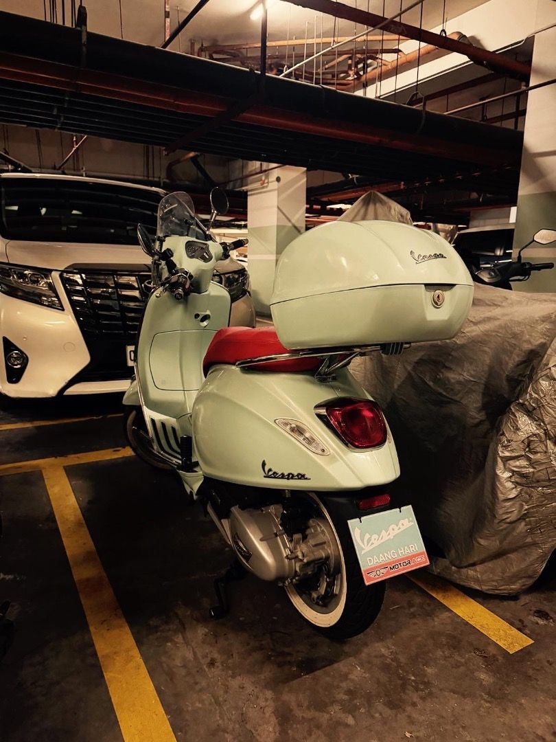 Vespa Primavera Scooter with Top Box (Category: Motorbikes for Sale) located in Caloocan City. Submitted by cg031 (Listing ID 1462788221, Image 2). Description: Light blue Vespa Primavera scooter. Comes with a matching top box and a red seat. Has a windscreen. Ready for your next ride. Great for city commuting..
