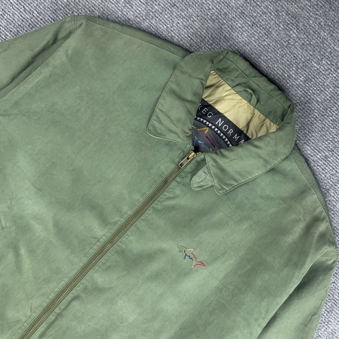 Vintage Greg Norman Collection Golf Harrington Jacket (Category: Coats, Jackets and Outerwear) located in Baguio. Submitted by vintage_lurker (Listing ID 1462852688, Image 2). Description: Size on tag: Large Width: 27” Length: 28” Issue/s: none Mine: 690 + Shipping fee 📍Payment first policy. no COD or COP 📍All items Washed and Sanitized 🧼 Shoot your offer. I’m all ears‼️ OTHER DETAILS: - Greg Norman Collection green jacket - Signature shark lo