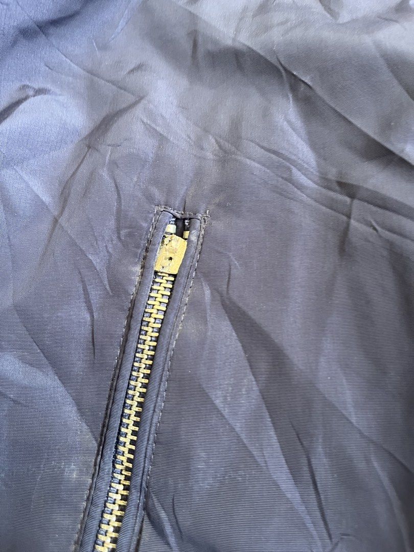 Vintage Kenzo Blue Bomber Jacket (Category: Coats, Jackets and Outerwear) located in San Pedro. Submitted by lewisbadinas06 (Listing ID 1462694919, Image 2). Description: Kenzo Bomber Jacket 22W 27L Issue Pocket Zipper (Handles only still working) Ribbings Color Fading Color Rate 7/10.