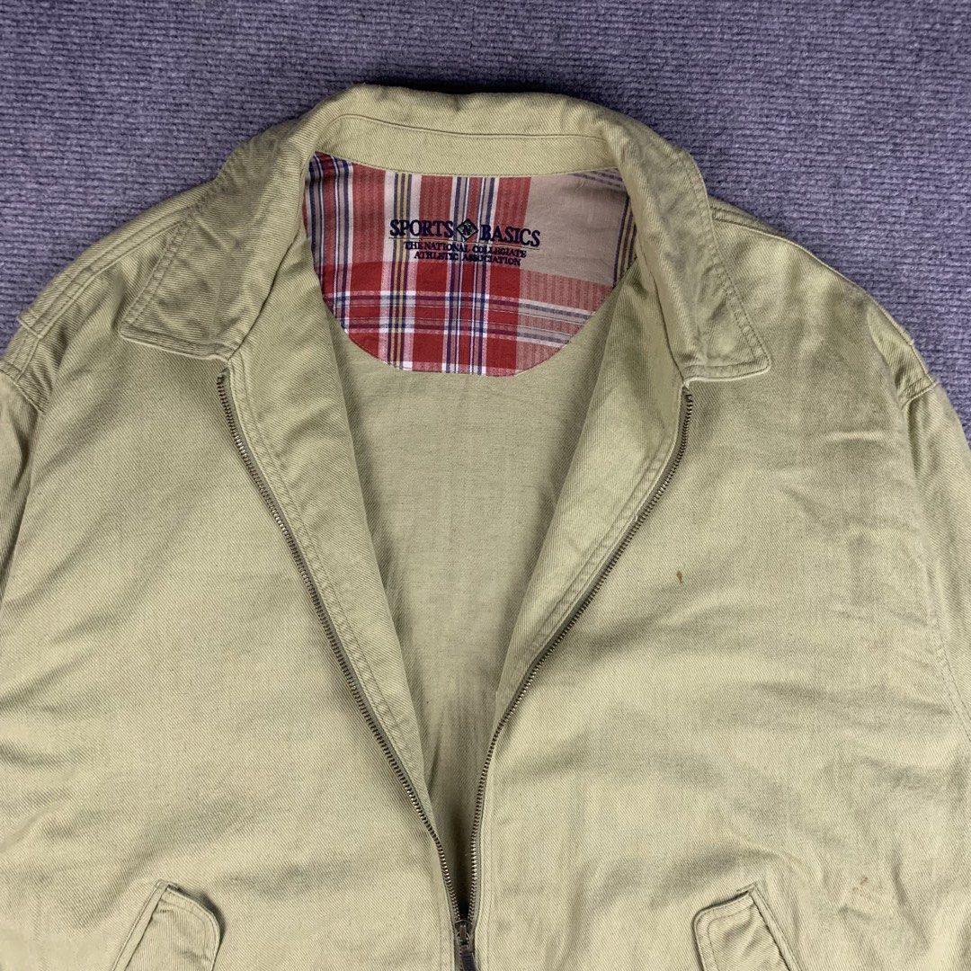 Vintage NCAA Harrington Jacket (Category: Coats, Jackets and Outerwear) located in Baguio. Submitted by vintage_lurker (Listing ID 1462853197, Image 3). Description: Size on tag: XL Width: 27” Length: 28” Issue/s: small rust stain Mine: 570 + Shipping fee 📍Payment first policy. no COD or COP 📍All items Washed and Sanitized 🧼 Shoot your offer. I’m all ears‼️ OTHER DETAILS: - Light green jacket from Sports N Basics - Features a cozy plaid lining