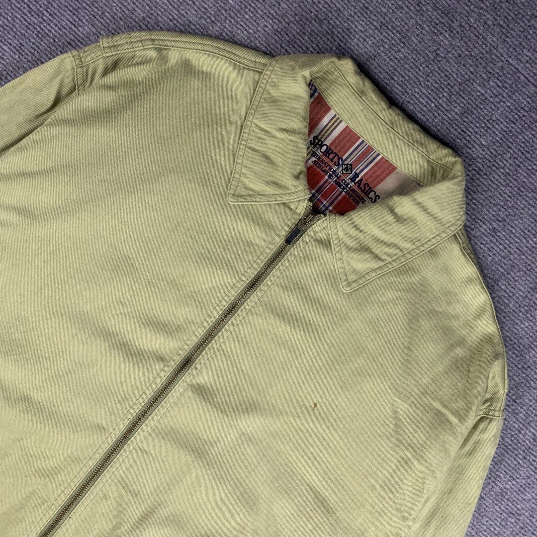 Vintage NCAA Harrington Jacket (Category: Coats, Jackets and Outerwear) located in Baguio. Submitted by vintage_lurker (Listing ID 1462853197, Image 2). Description: Size on tag: XL Width: 27” Length: 28” Issue/s: small rust stain Mine: 570 + Shipping fee 📍Payment first policy. no COD or COP 📍All items Washed and Sanitized 🧼 Shoot your offer. I’m all ears‼️ OTHER DETAILS: - Light green jacket from Sports N Basics - Features a cozy plaid lining
