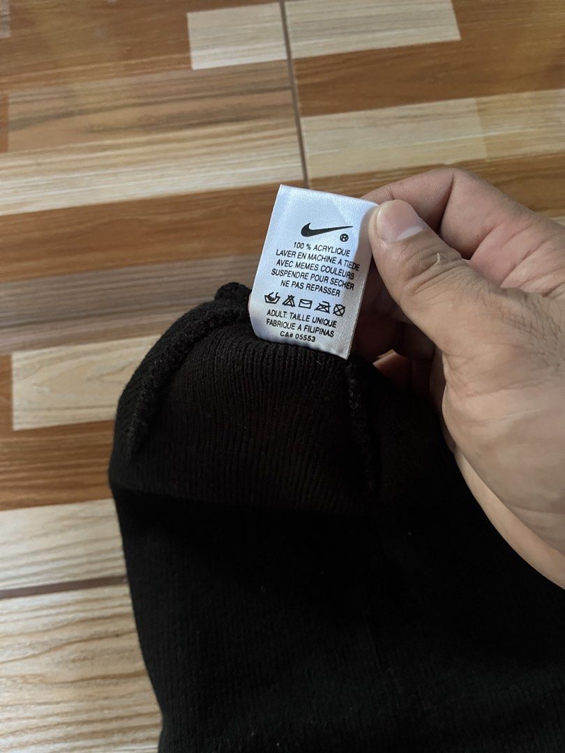 Vintage Nike Black Acrylic Beanie Hat (Category: Caps & Hats) located in Nabua. Submitted by lastthrift2.0 (Listing ID 1462842885, Image 3). Description: - Brand: Nike - Color: Black - Material: 100% Acrylic - Size: Adult One Size Fits All - Care Instructions: Machine wash warm with colors, line dry, do not iron - Origin: Made in the Philippines - Benefit: Great for keeping warm.