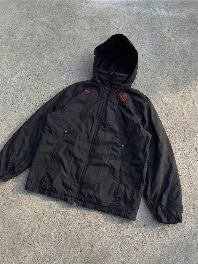 Vintage Nike T90 Windbreaker Jacket (Category: Coats, Jackets and Outerwear) located in Manila. Submitted by hiddenvaultph (Listing ID 1462695178, Image 2). Description: Pristine Deadstock 💯 Size: L on tag Width: 24 Length: 30 Good as new Hoodie can be detach from the jacket MOP: Gcash Shipping:JNT Location: Antipolo.