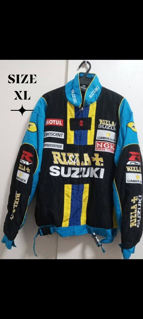Vintage Rizla Suzuki Racing Jacket XL (Category: Coats, Jackets and Outerwear) located in Manila. Submitted by coolstar-d2cc (Listing ID 1462838426, Image 3). Description: Vintage Rizla Suzuki racing jacket, XL. Blue, black, yellow color-block with embroidered sponsor patches (Motul, Bridgestone, etc.). Perfect for Suzuki/MotoGP fans..