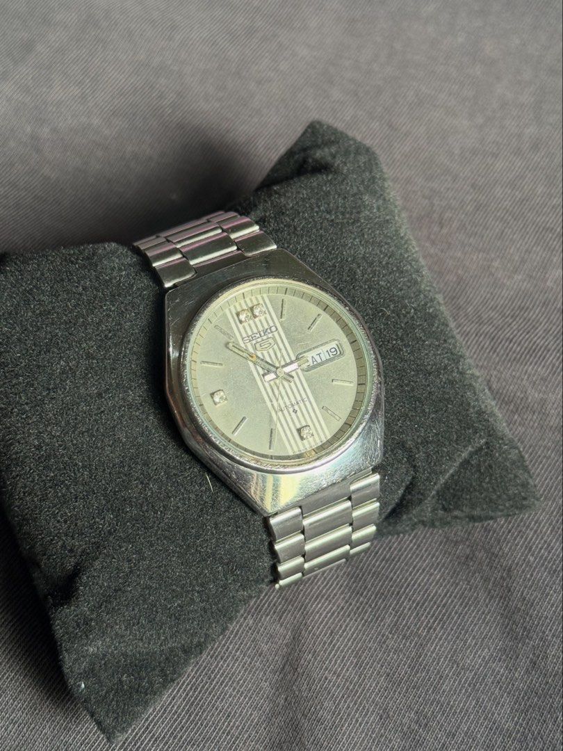 Vintage Seiko 5 Day-Date Silver (Category: Men's Watches) located in Manila. Submitted by vtg.nat (Listing ID 1462734072, Image 1). Description: Vintage Seiko 5 Day-Date Silver • Ref. 6309-720B • Automatic Movement • Case size 37mm • Fits 7.5–8 inch wrist • Silver textured dial • Vintage condition, with signs of age/use Vintage/pre-owned item. Please manage expectations regarding age, wear, and condition. Sold as-is, as shown in the photos. .