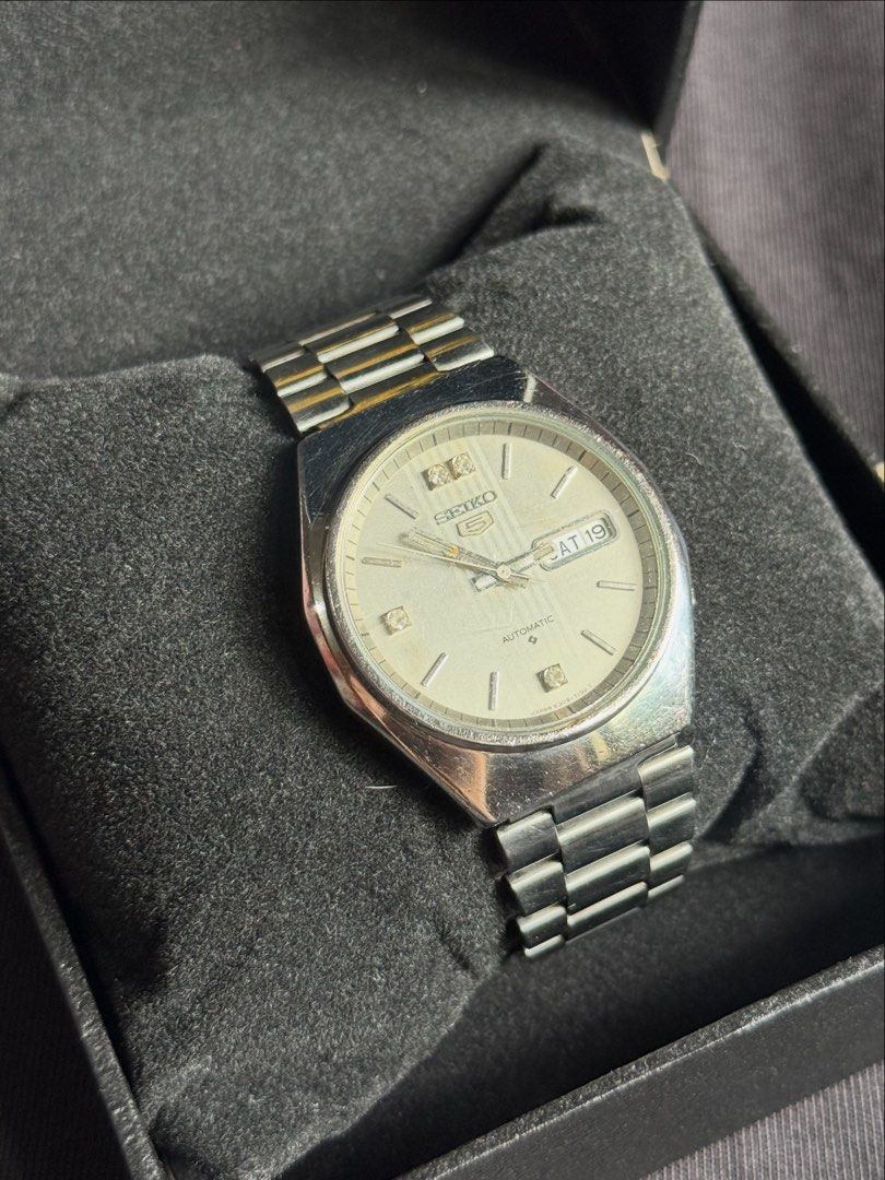 Vintage Seiko 5 Day-Date Silver (Category: Men's Watches) located in Manila. Submitted by vtg.nat (Listing ID 1462734072, Image 2). Description: Vintage Seiko 5 Day-Date Silver • Ref. 6309-720B • Automatic Movement • Case size 37mm • Fits 7.5–8 inch wrist • Silver textured dial • Vintage condition, with signs of age/use Vintage/pre-owned item. Please manage expectations regarding age, wear, and condition. Sold as-is, as shown in the photos. .