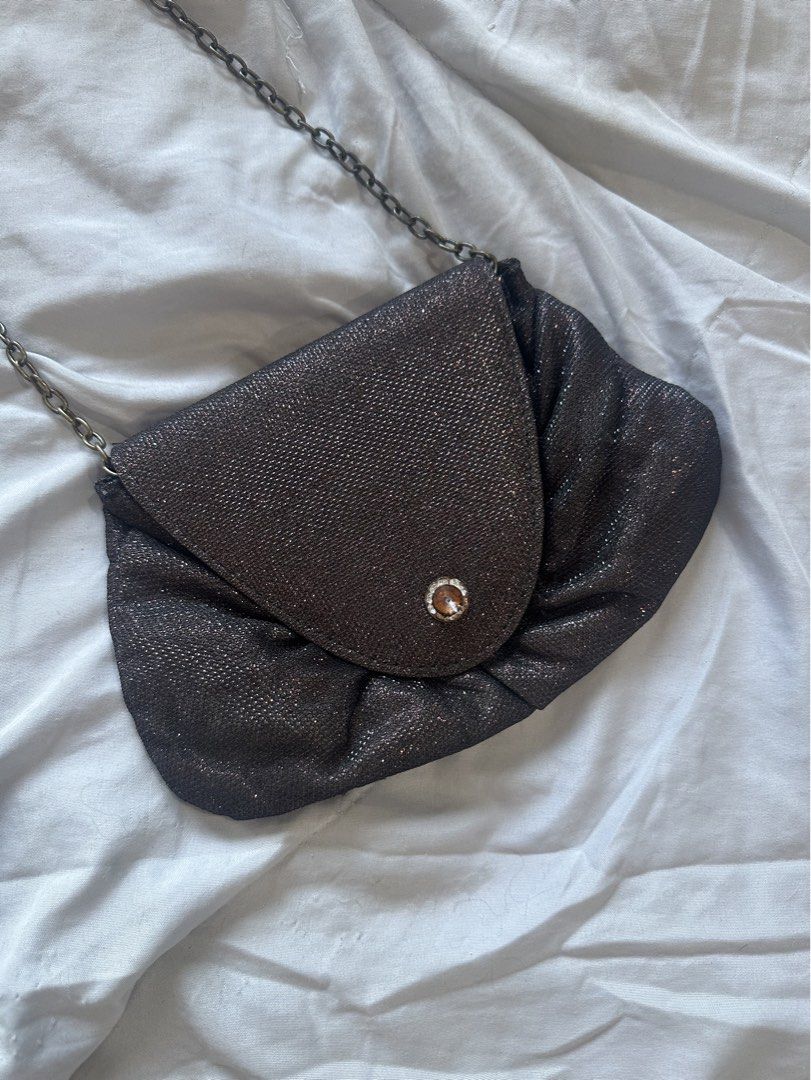 Vintage sling bag (Category: Cross-body Bags) located in Paranaque City. Submitted by celinegab (Listing ID 1462707017, Image 1). Description: Issue: front charm is missing an accent gem.