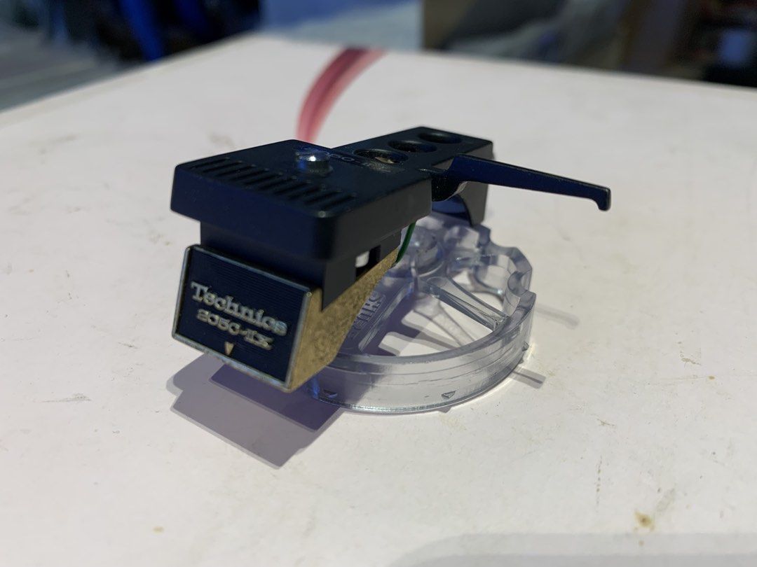 Vintage Technics 2050-IIx Turntable Cartridge & Headshell ((NO NEEDLE) (Category: Vinyls) located in Paranaque City. Submitted by seb_trading (Listing ID 1462767168, Image 2). Description: (NO NEEDLE INCLUDED) original Technics product working cartridge & headshell Model: 2050-IIx for wifi enthusiast last price Paranaque area.