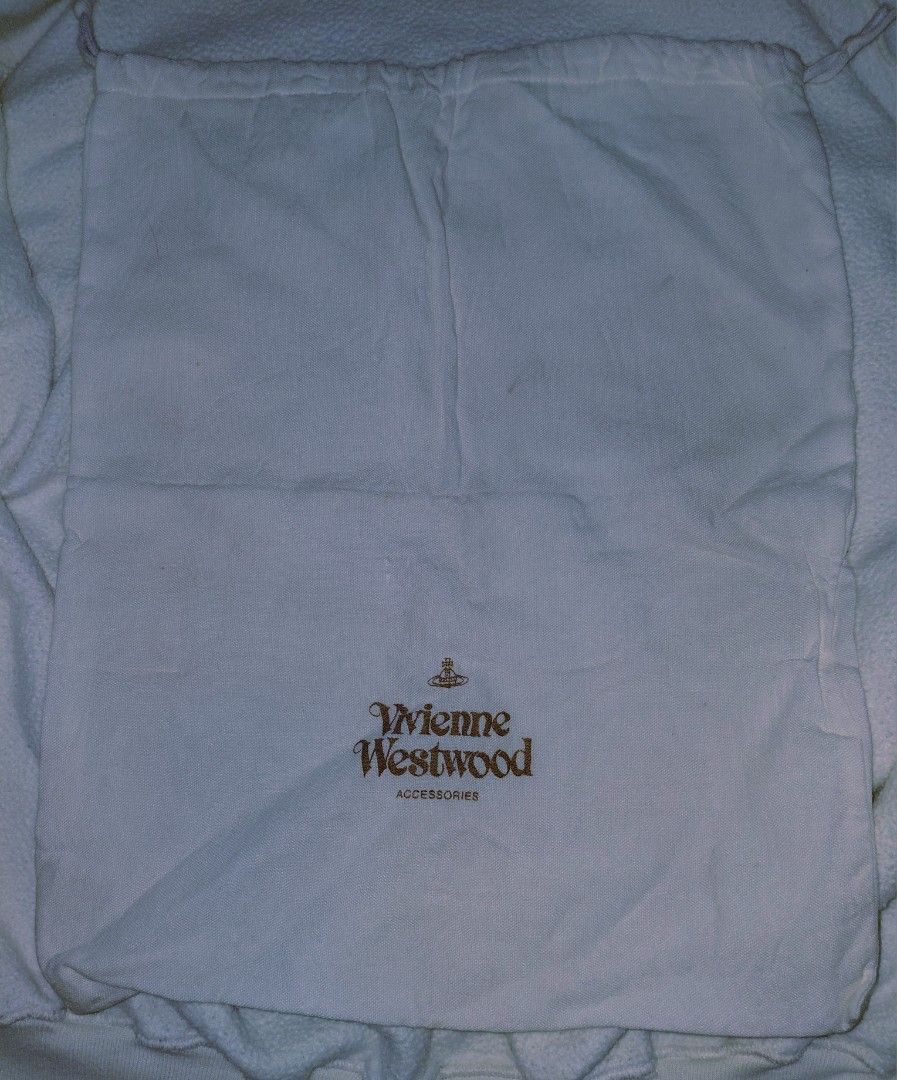 Vivienne Westwood Dust Bag (Category: Shoulder Bags) located in Quezon City. Submitted by girldolphin (Listing ID 1462796709, Image 1). Description: Pickup near Amoranto Sports Complex.