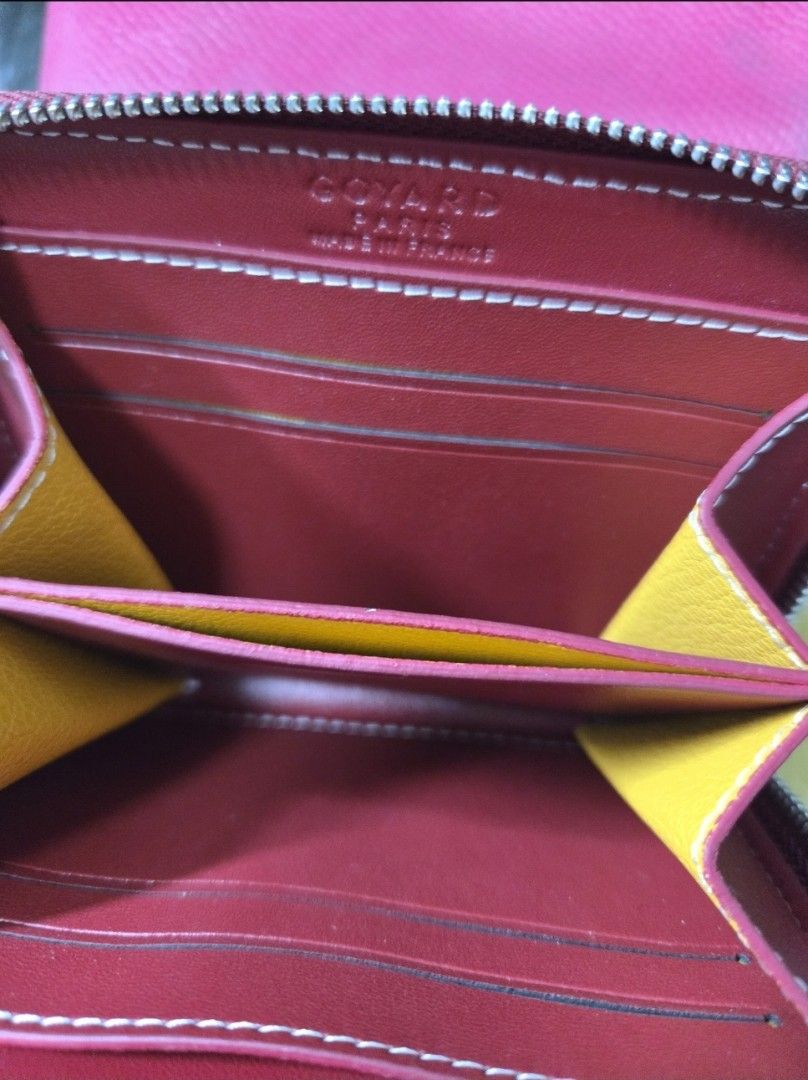 Wallet (Coach & Goyard) (Category: Luxury Bags & Wallets) located in Manila. Submitted by luxtimeless (Listing ID 1462797879, Image 2). Description: - Coach pink wristlet pouch with secure zip closure and convenient wrist strap. - Goyard zip wallet **Get both for only 700.