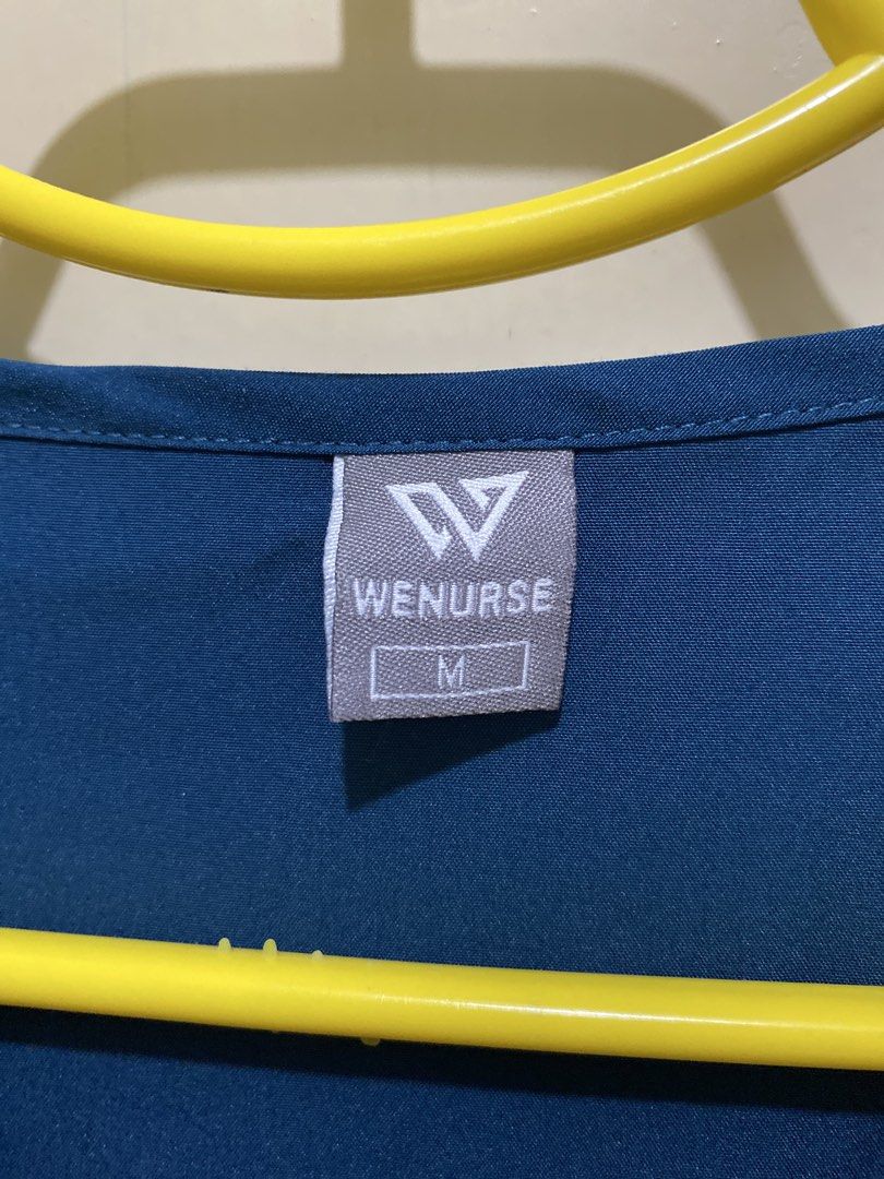 Teal Scrub Suit Top and Pants Set - Size M (Category: Sets or Coordinates) located in Pasig City. Submitted by alaineeeee (Listing ID 1462774700, Image 2). Description: - Teal scrub set (top and pants) from WENURSE - Size: Medium - Top features a V-neck and multiple pockets - Pants have an elastic waistband with a drawstring and side pockets - Comfortable and practical for everyday wear - Selling as a complete set.