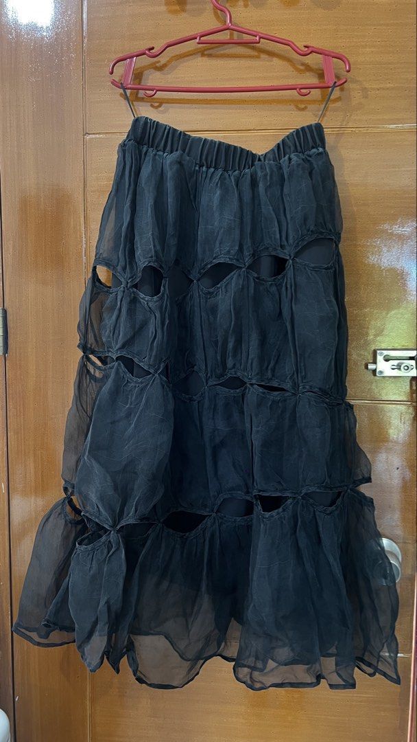 Whimsical Black Long skirt (Category: Skirts) located in Cavite. Submitted by chocolat.meilleure (Listing ID 1462720698, Image 1). Description: Eccentric type Long black skirt Model in photo is 5’2 use as reference for length Graterized.