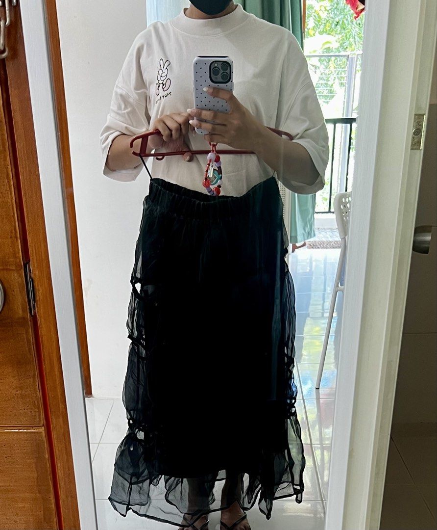 Whimsical Black Long skirt (Category: Skirts) located in Cavite. Submitted by chocolat.meilleure (Listing ID 1462720698, Image 2). Description: Eccentric type Long black skirt Model in photo is 5’2 use as reference for length Graterized.