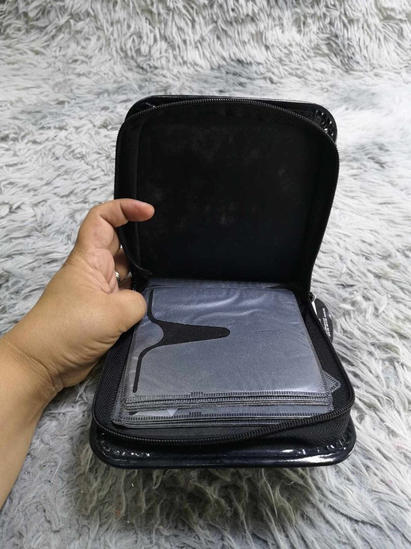 White & Black Panda Themed Zippered Disc Storage (Category: Stationery & School Supplies) located in Santa Cruz. Submitted by jmy_surplus.2 (Listing ID 1462790760, Image 2). Description: Size ; L- 7 W - 6.4 Color ; Black , White Type ; Disc Storage Brand ; No branf Material ; Synthetic Style ; Zipper Closure Durable Disc Storage LR 129 JMY 5 Batch #222.