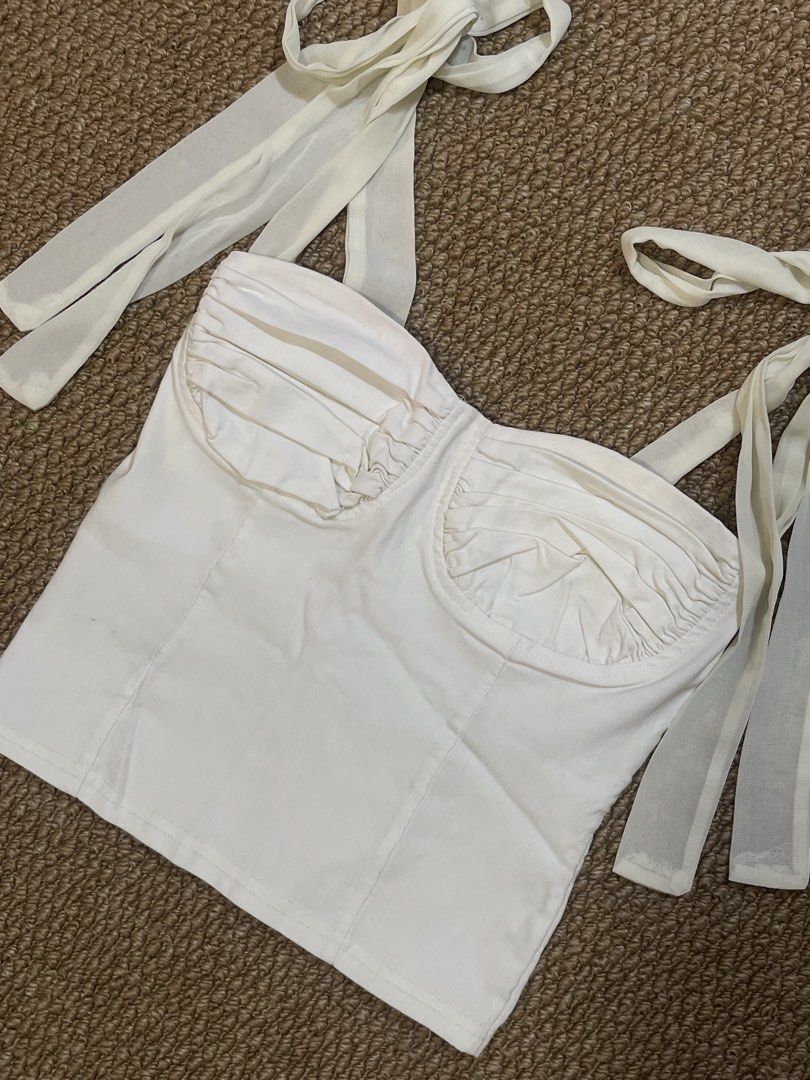 White Corset Bustier Top with Tie Straps (Category: Sleeveless) located in Pasig City. Submitted by miafml-closet-cleanout (Listing ID 1462806540, Image 3). Description: posted price is fixed ♡ will not respond to hagglers. 💵 mop: gcash / bdo / maribank / unionbank 🛵 courier: any as long as arranged by buyer 🙅🏻‍♀️ no requested worn photos ❌ no meet-ups.