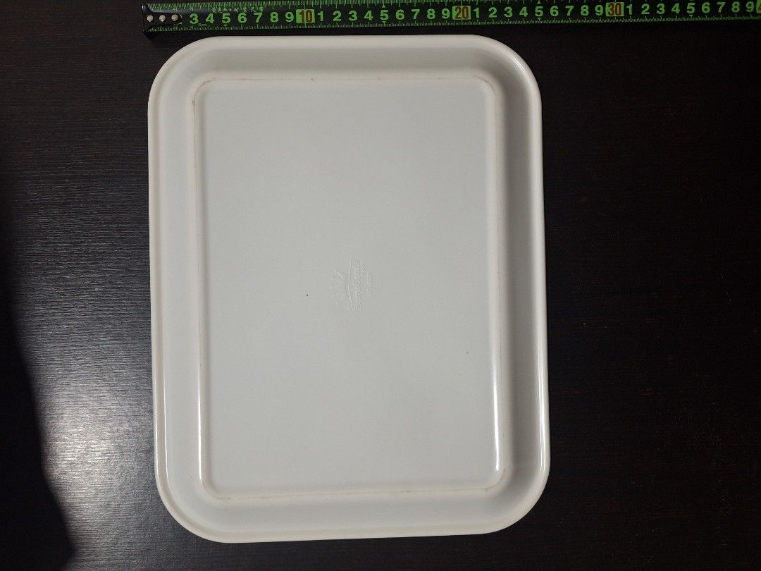 White Rectangular Serving Tray (Category: Dinnerware & Cutlery) located in Singapore. Submitted by florinsthon (Listing ID 1462867228, Image 3). Description: - White rectangular tray - Versatile: Use for serving food/drinks or organizing small items - Features a slight lip around the edge - Dimensions: Approx. 32cm x 25cm - Clean and simple design - $10 for 3pcs.