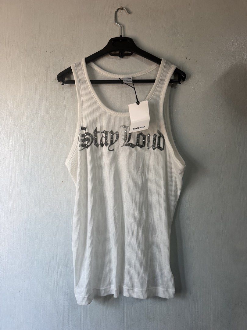 White sando (Category: Tshirts & Polo Shirts ) located in Taguig. Submitted by roxjl (Listing ID 1462710159, Image 1). Description: Bershka sando Size Large.