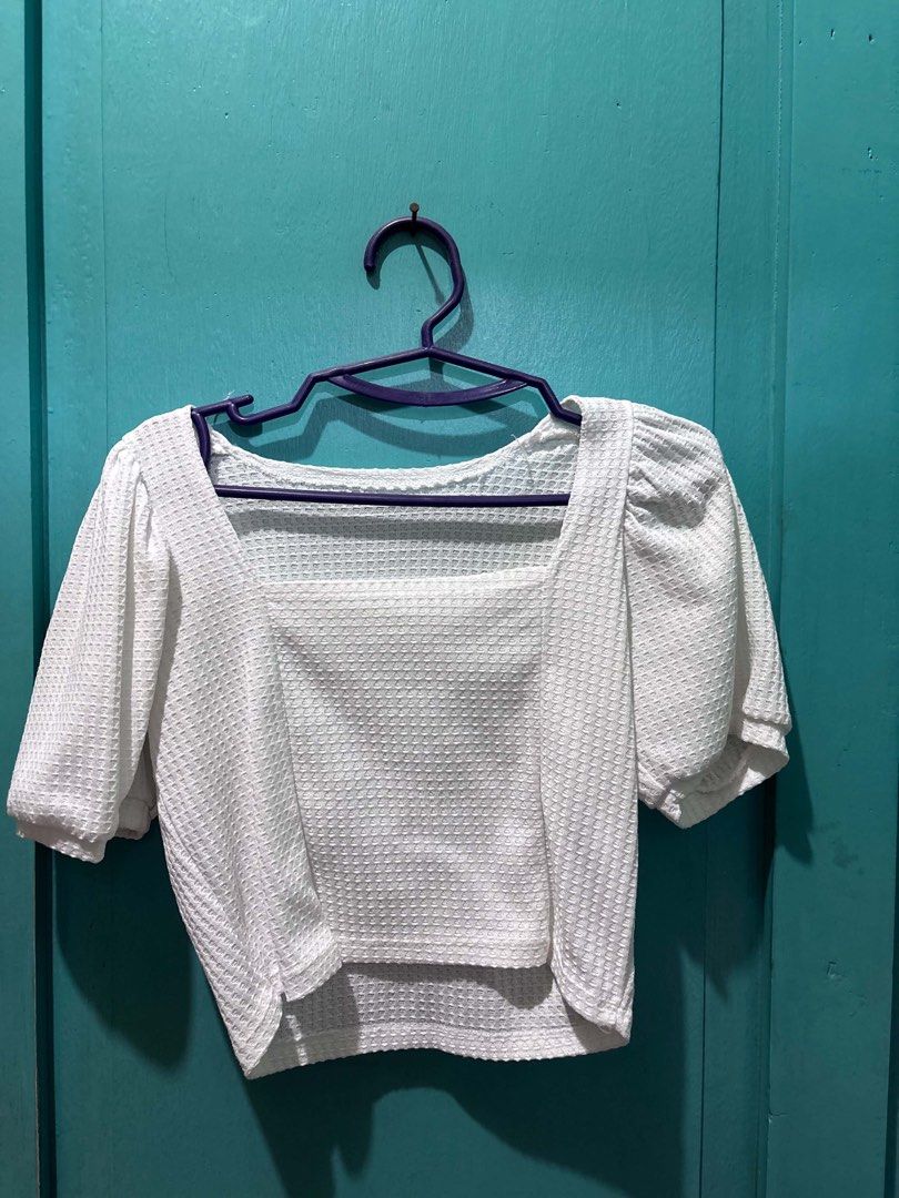 White Square Neck Puff Sleeve Textured Crop Top (Category: Blouses) located in Cabuyao City. Submitted by dumbonita (Listing ID 1462837333, Image 1). Description: - Adorable white crop top - Textured waffle-like fabric - Flattering square neckline - Cute short puff sleeves - Slightly cropped hem with a subtle curved cut - Versatile for casual or dressy outfits - Pairs perfectly with high-waisted jeans, skirts, or shorts - Ideal for everyday wear 