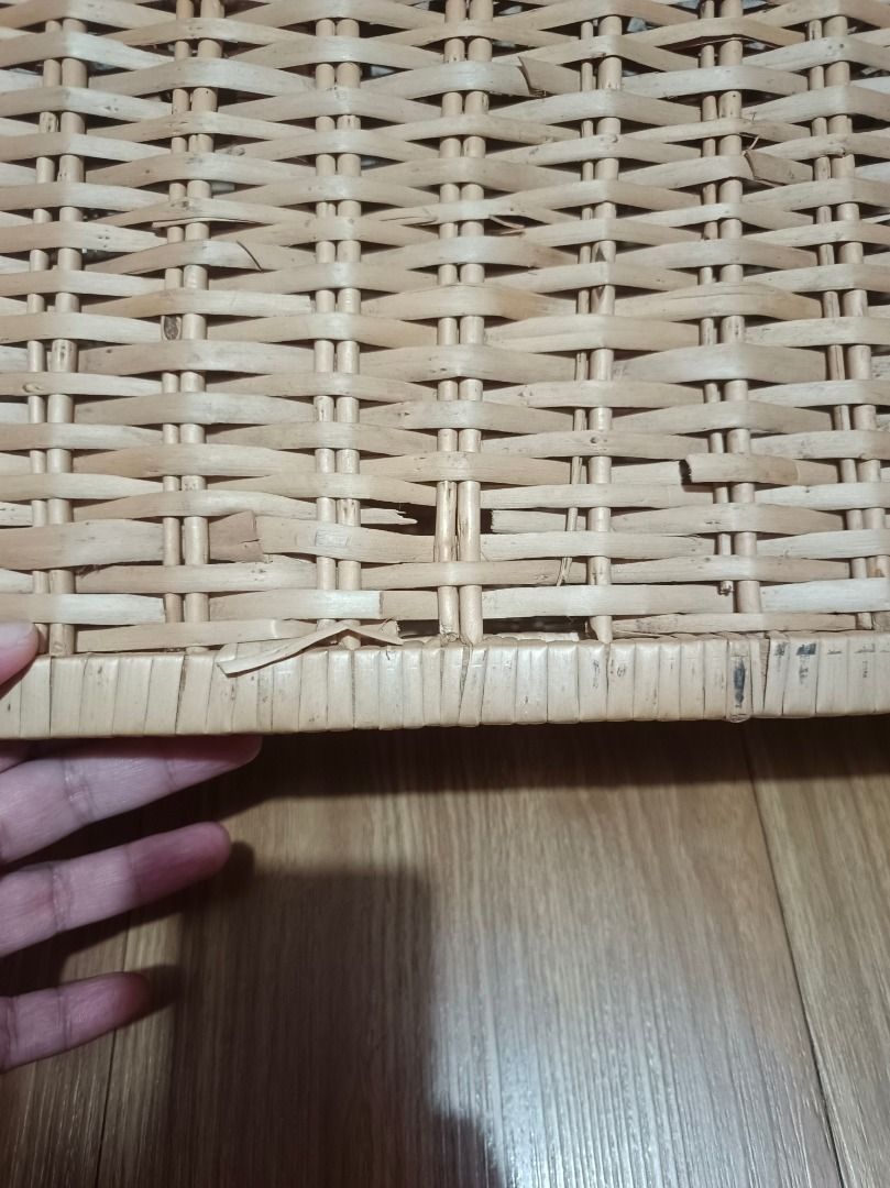 Wicker Storage Box with Lid (Category: Storage Boxes & Baskets) located in Makati City. Submitted by nyxhemera26 (Listing ID 1462877640, Image 3). Description: Wicker Storage Box with Lid - With minimal flaws on the lid. Please see photos - Woven wicker storage box - Features a hinged lid - Ideal for organizing and decluttering any space - Approximate dimensions: 21 inches (Length) x 12 inches (Width) x 9 inches (Height) - Made from natural woven