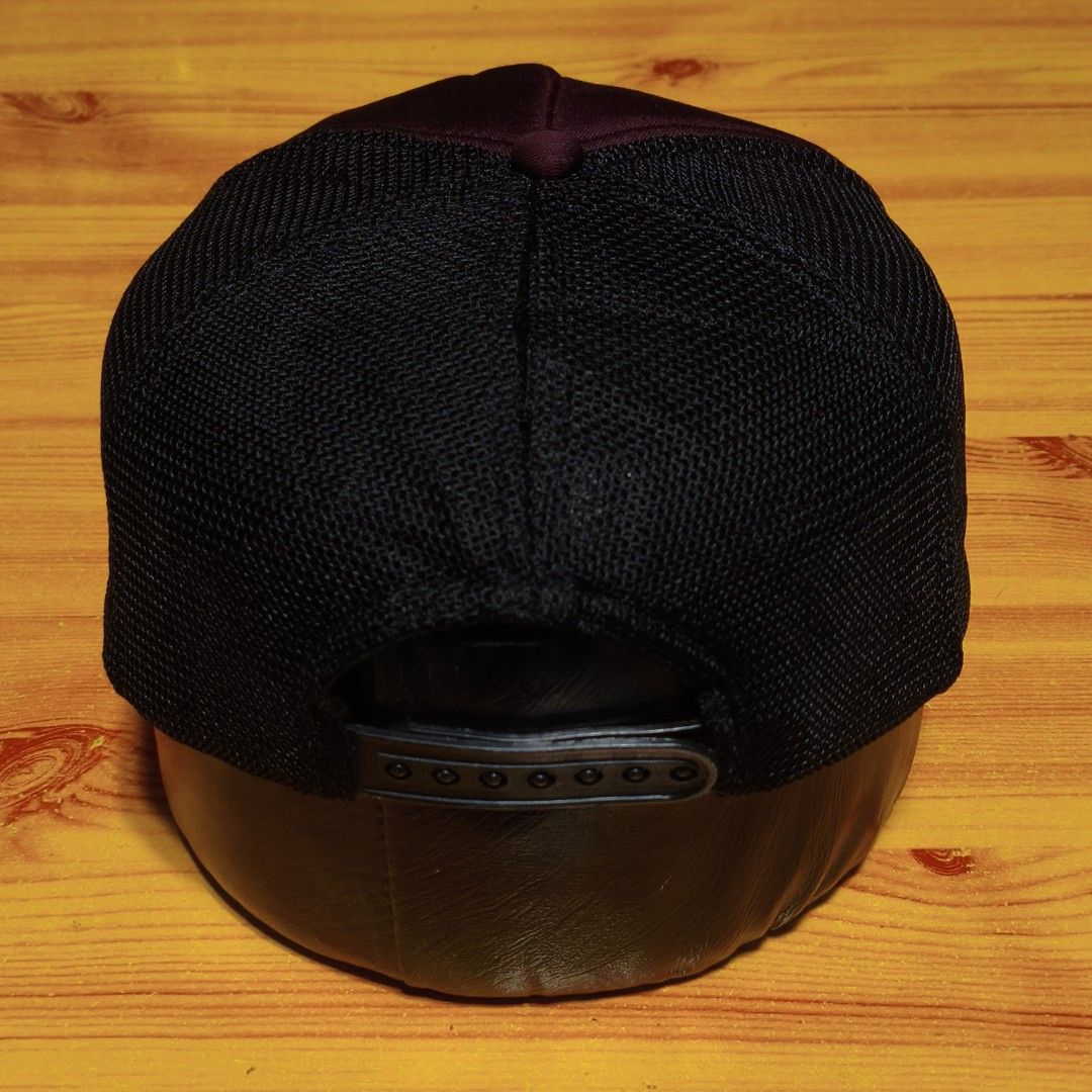 Wild Solitude Trucker Cap Burgundy Black Mesh (Category: Caps & Hats) located in Manila. Submitted by caps08 (Listing ID 1462875411, Image 3). Description: - Burgundy and black trucker cap - Features 'Wild Solitude' patch with mountain graphic - Breathable mesh back - Adjustable snapback closure - Ideal for outdoor adventures and everyday wear.