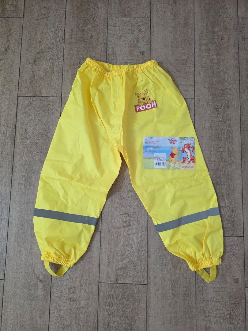 Winnie the Pooh waterproof rain pants (Category: Babies & Kids Fashion) located in Quezon City. Submitted by preloved_by_mariekondo (Listing ID 1462743379, Image 1). Description: Size L or fits 7-8yo Brand New, never been used In original zip lock bag Durable waterproof material Loose fitting to put on top of clothes.
