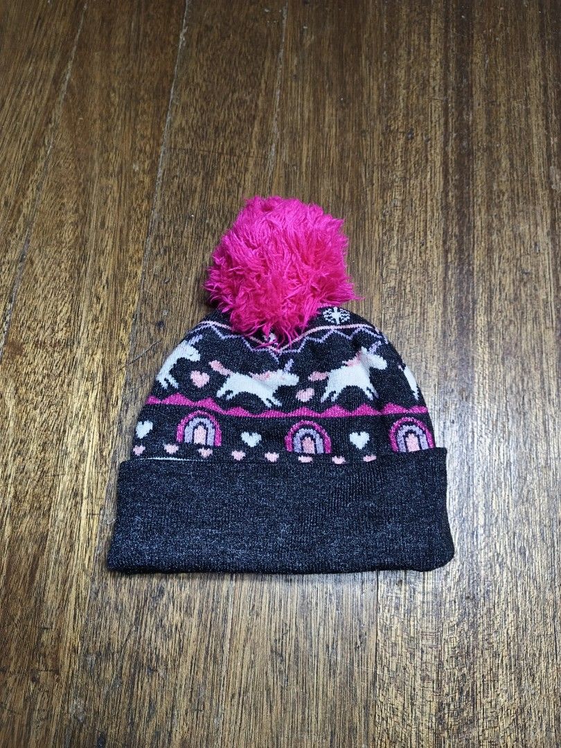 Winter beanie hat kids 2-5 years old (Category: Babies & Kids Fashion) located in Mandaluyong City. Submitted by heatgear (Listing ID 1462830423, Image 1). Description: - Adorable kids' beanie with all-over unicorn and rainbow print. - Topped with a fun, bright pink pom pom. - Lined with soft, warm material for extra comfort. - Fits sizes 2T to 5T. - Ideal for keeping little ones warm during cooler weather..