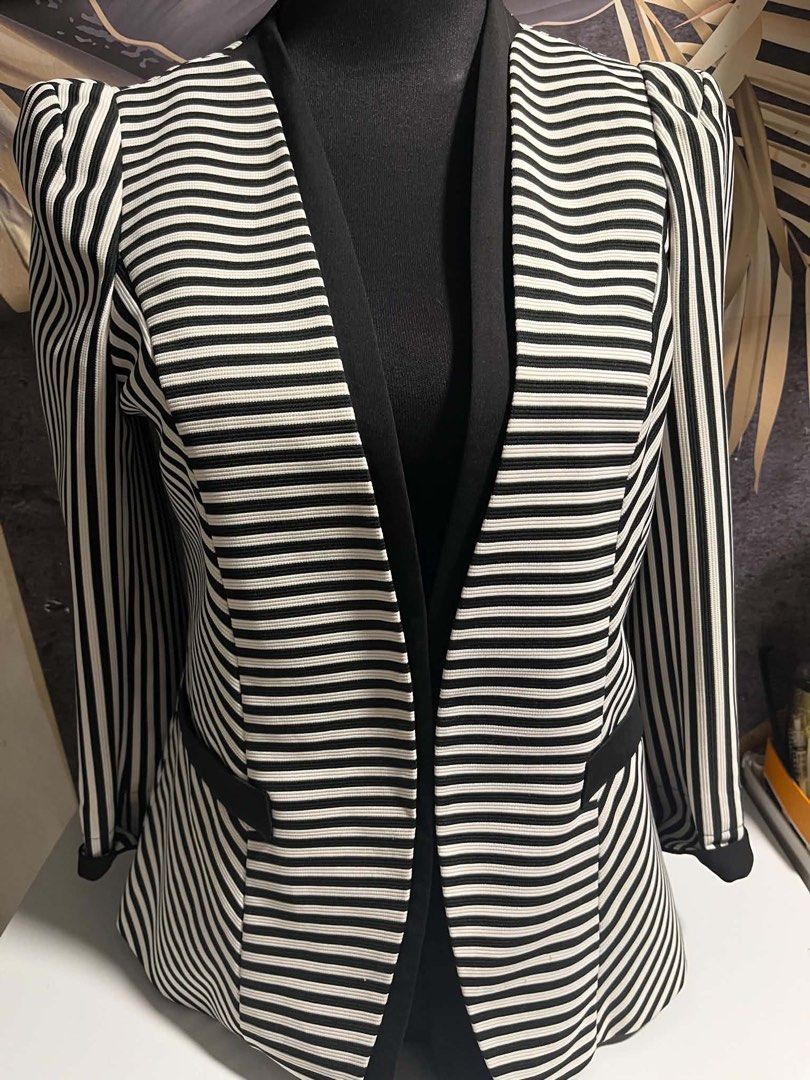Womans blazers (Category: Coats, Jackets and Outerwear) located in Caloocan City. Submitted by trebdy01 (Listing ID 1462881624, Image 3). Description: Pre owned Very own condition Black Navy blue Stripes Can fit to Small to medium frame.