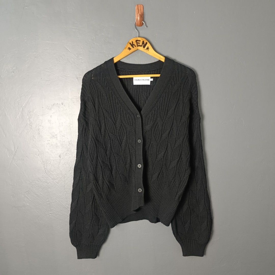 Women's - Calvin Klein (Category: Coats, Jackets and Outerwear) located in Bacolod City. Submitted by drop.ph (Listing ID 1462821226, Image 2). Description: Calvin Klein - Cable Knit Cardigan Authentic *Size L - 21.5x24 *Excellent *No flaws *Price: 1,200php *Add SF if outside Bacolod City.
