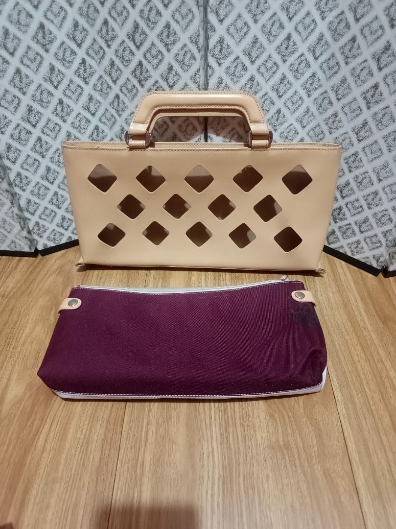 WOMEN'S HANDBAG (Category: Tote Bags) located in Makati City. Submitted by nyxhemera26 (Listing ID 1462825872, Image 3). Description: WOMEN'S HANDBAG 🚫 WITH FLAWS, SEE PHOTOS FOR THE CONDITION OF THE BAG 🚫NEEDS CLEANING - Unique diamond cutout design - Includes removable inner pouch .