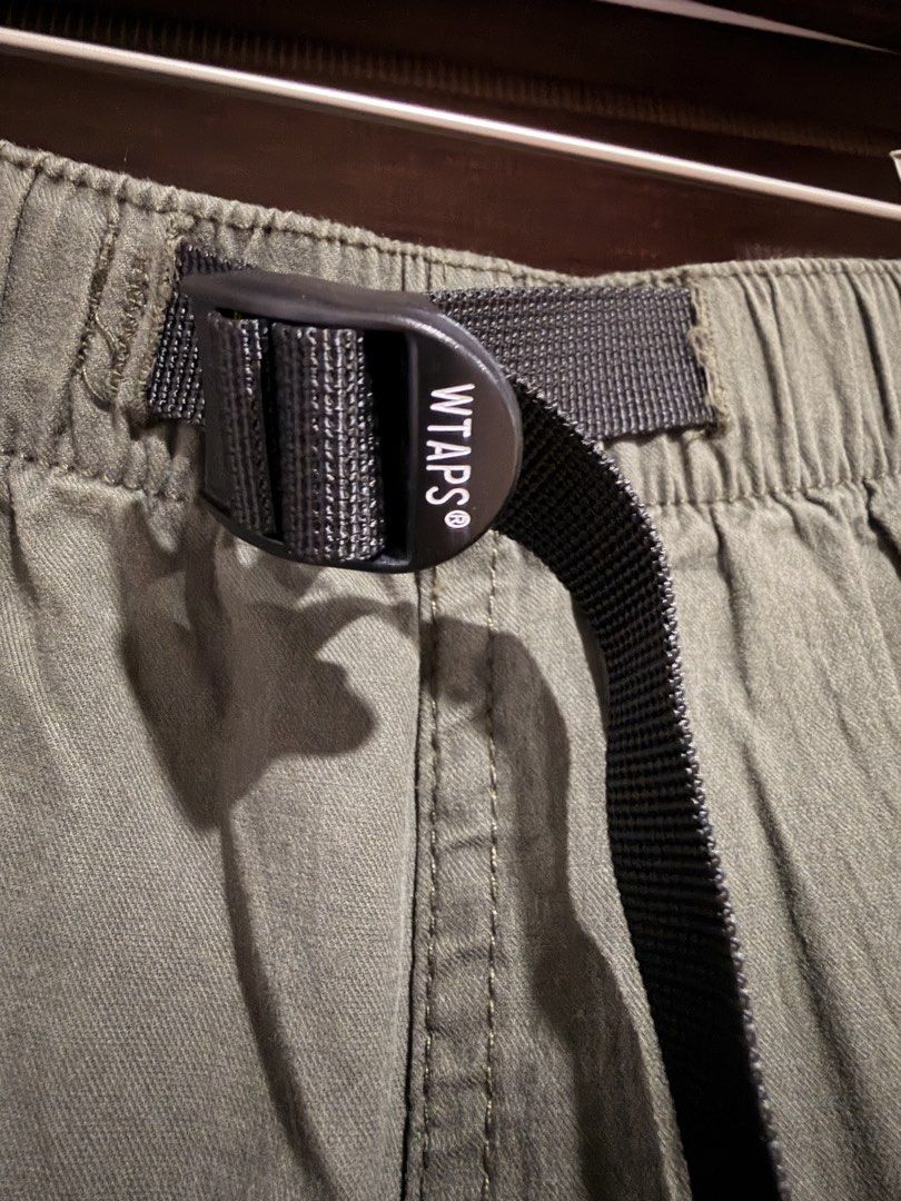 WTAPS Cargo Pants Olive Green Belted Jogger Style (Category: Joggers) located in Manila. Submitted by furugi24 (Listing ID 1462777047, Image 3). Description: - Brand: WTAPS - Color: Olive Green - Style: Cargo Jogger Pants - Dimension WAIST: 32-36 inches (adjustable) Length: 39 inches SRP : 1500 - Features: Elasticated cuffs, built-in adjustable belt with quick-release buckle, multiple storage pockets .