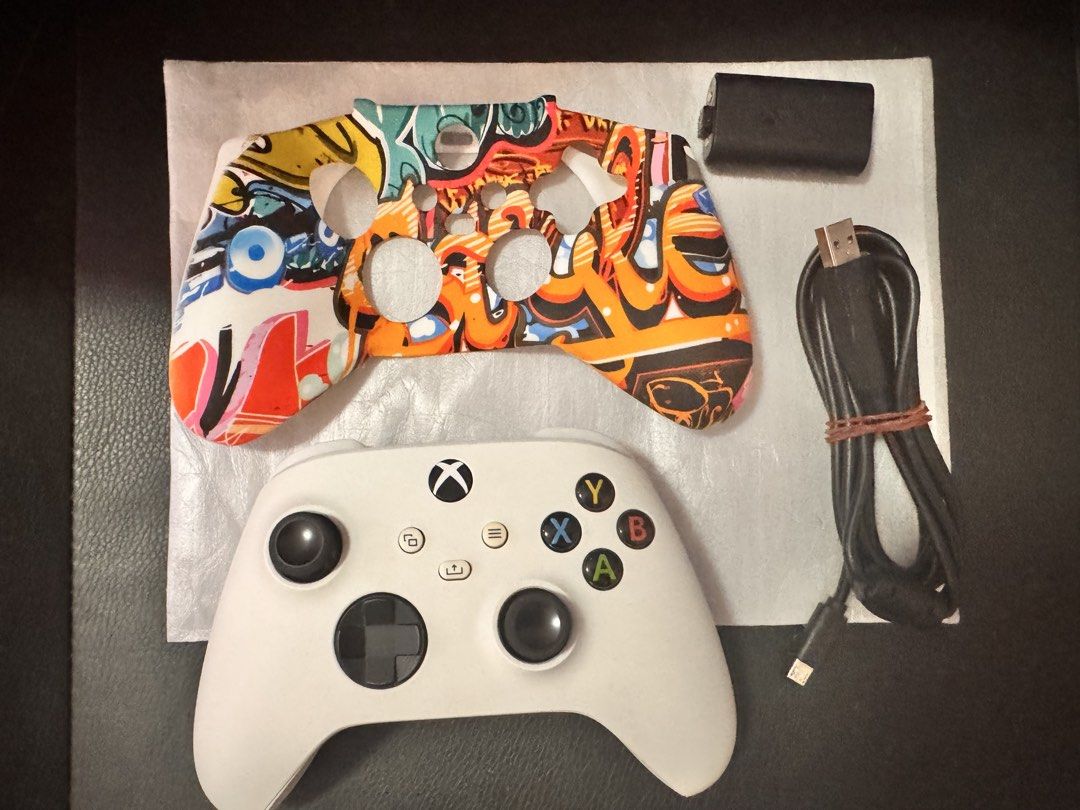 Xbox Series Controller (Category: Controllers) located in Quezon City. Submitted by helloandgoodbuy (Listing ID 1462762806, Image 1). Description: ✅ Tested in excellent working condition. ✅ White color. ✅ Free Silicon Case/Cover ✅ Free Charging Cable ✅ Bonus Original Xbox Battery ✅ Compatible with Xbox One and Xbox Series consoles. ✅ With Bluetooth functionality to connect for PC and mobile gaming. ✅ Meet up at Petron Atherton Fairview or SM Nova
