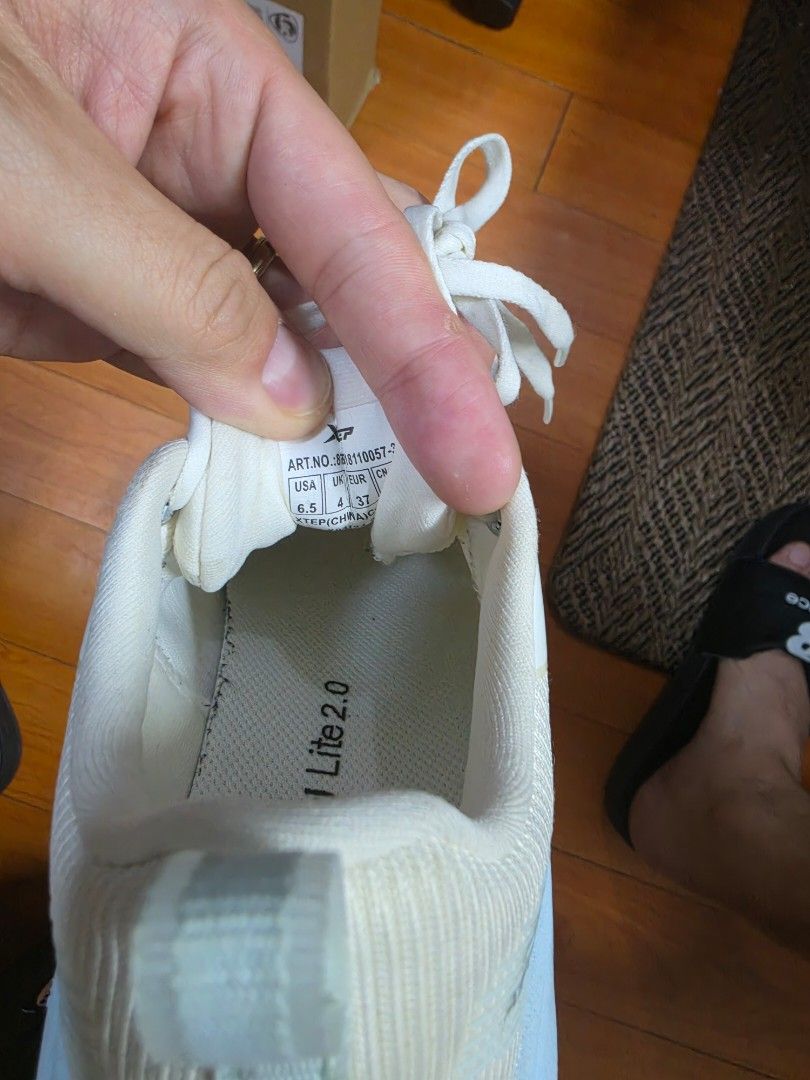xtep Lite 2.0 Running Shoes White/Blue (Category: Sneakers) located in Muntinlupa City. Submitted by kc_10 (Listing ID 1462698084, Image 1). Description: - Model: Lite 2.0 - Size: 6.5 US Women's - Color: White and Light Blue - Features: Lightweight, Comfortable - Perfect for: Running or Casual Wear.