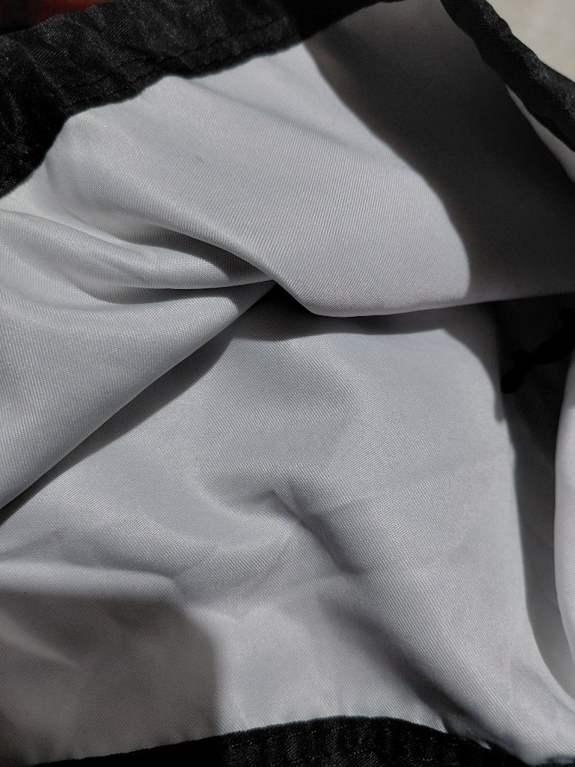 Y-3 Black Drawstring Dust Bag (Category: Luxury Bags & Wallets) located in Pozorrubio. Submitted by aquidafinds (Listing ID 1462815796, Image 3). Description: - Black Y-3 dust bag - White Y-3 logo print - Dual drawstring closure - Ideal for storing shoes or accessories - Approximate dimensions: 15 inches x 12 inches - Made from smooth synthetic fabric.