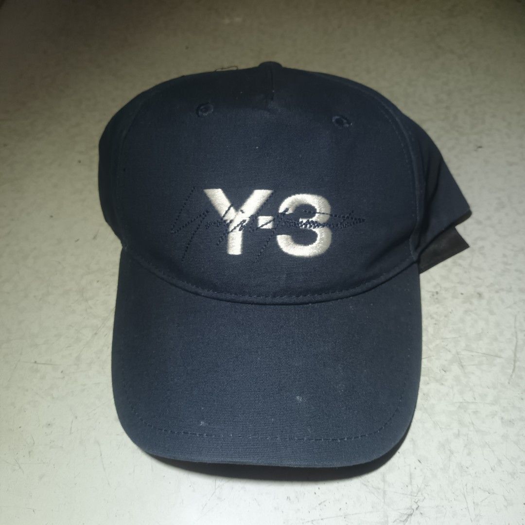Y-3 Signature In Navy Blue (Category: Caps & Hats) located in Manila. Submitted by itsnik444 (Listing ID 1462873568, Image 1). Description: Mode of Payments: •GCASH Courier: • LALAMOVE ( Same day Delivery) • J&T EXPRESS • LBC ❗️ Product color may slightly vary due to photographic ❗️ DISCLAIMER: We are not associated or affiliated with any brand posted.
