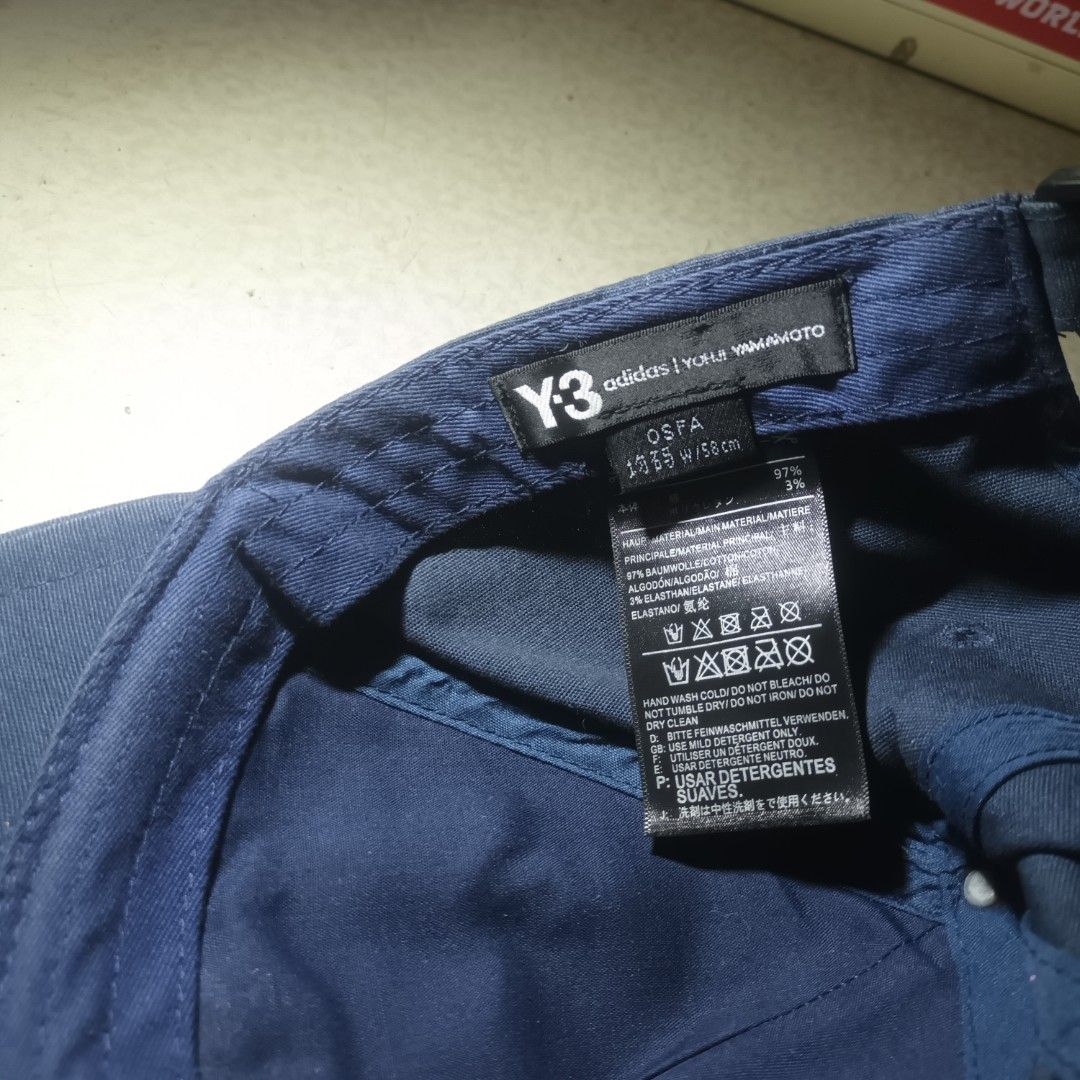 Y-3 Signature In Navy Blue (Category: Caps & Hats) located in Manila. Submitted by itsnik444 (Listing ID 1462873568, Image 3). Description: Mode of Payments: •GCASH Courier: • LALAMOVE ( Same day Delivery) • J&T EXPRESS • LBC ❗️ Product color may slightly vary due to photographic ❗️ DISCLAIMER: We are not associated or affiliated with any brand posted.