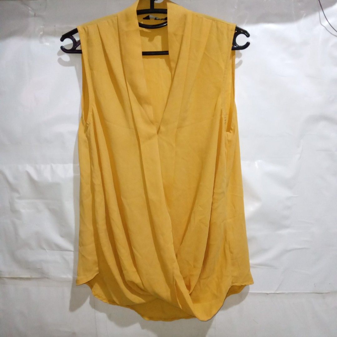 Yellow Pleated Drape Blouse (Category: Blouses) located in Manila. Submitted by cian.collectives (Listing ID 1462817816, Image 1). Description: ✨ Title: Yellow Pleated Drape Blouse Description: Can fit to M-L, Nice color, fabric, and style. Perfect for Formal and Casual wear. Price: 100.00 Flaws: none Payment Methods: Gcash, Maya (Payment First - No COD) 📍 Note: PLEASE MANAGE YOUR EXPECTATIONS, PRELOVED ITEMS, NO CANCELLATION. Feel free to messa