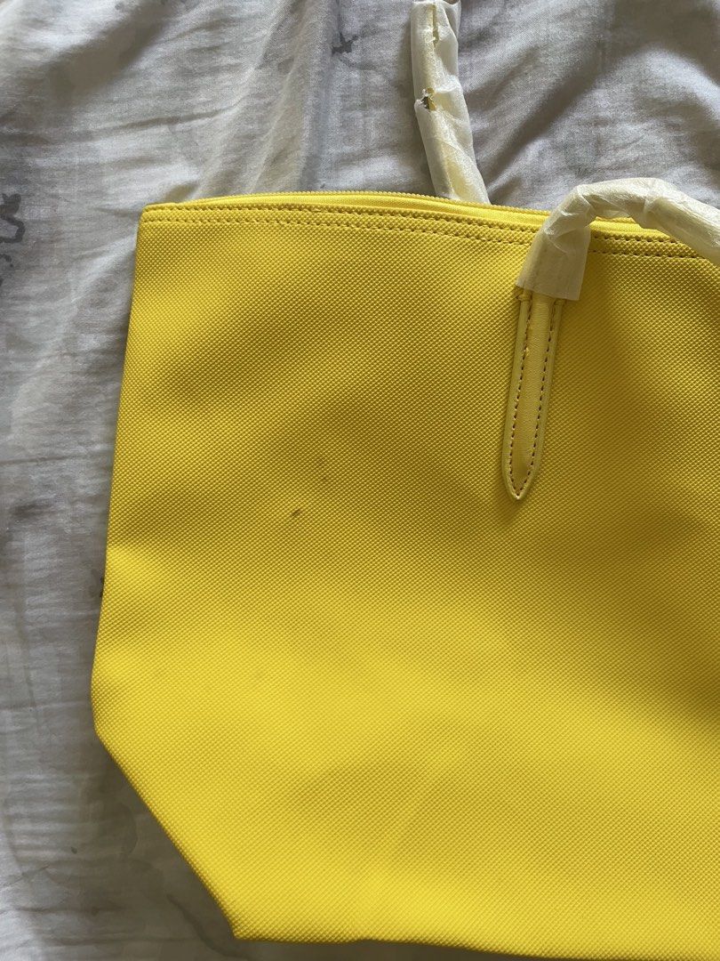 Yellow Tote Bag (Category: Tote Bags) located in Quezon City. Submitted by batto_sai (Listing ID 1462696685, Image 2). Description: Unused With stain at the back Last price.