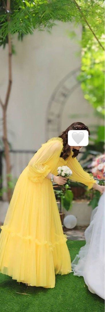 Bridesmaid Dress (Category: Evening dresses & gowns) located in Manila. Submitted by _preciousfinds.2 (Listing ID 1462720328, Image 2). Description: - Flowy yellow gown - Made with soft tulle fabric - Features long puffy sleeves with ruffled cuffs - Elegant square neckline - Floor length design - Ideal for special events and photoshoots - Comfortable for all-day wear Extra Small to Medium .