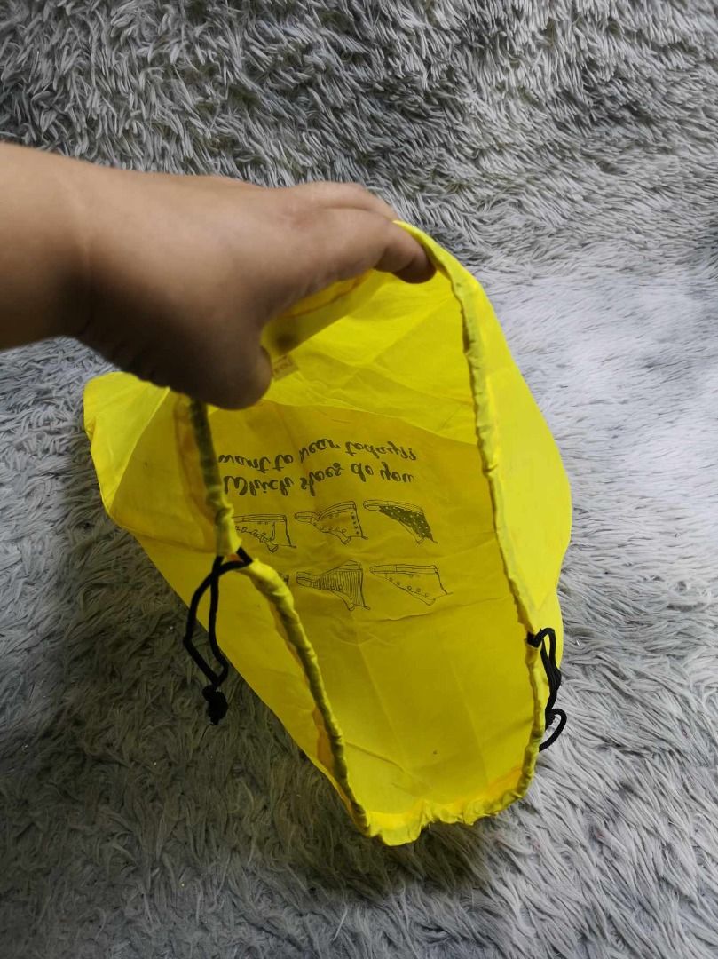 Yellow With Black String Pouch (Category: Purses & Pouches) located in Santa Cruz. Submitted by jmy_surplus.2 (Listing ID 1462703895, Image 2). Description: Size ; L - 17.3 W - 16 Color ; Yellow Type ; Pouch Brand ; No brand Material ; Nylon Style ; Yellow Drawstring Pouch LR 129 JMY 5 Batch #222.