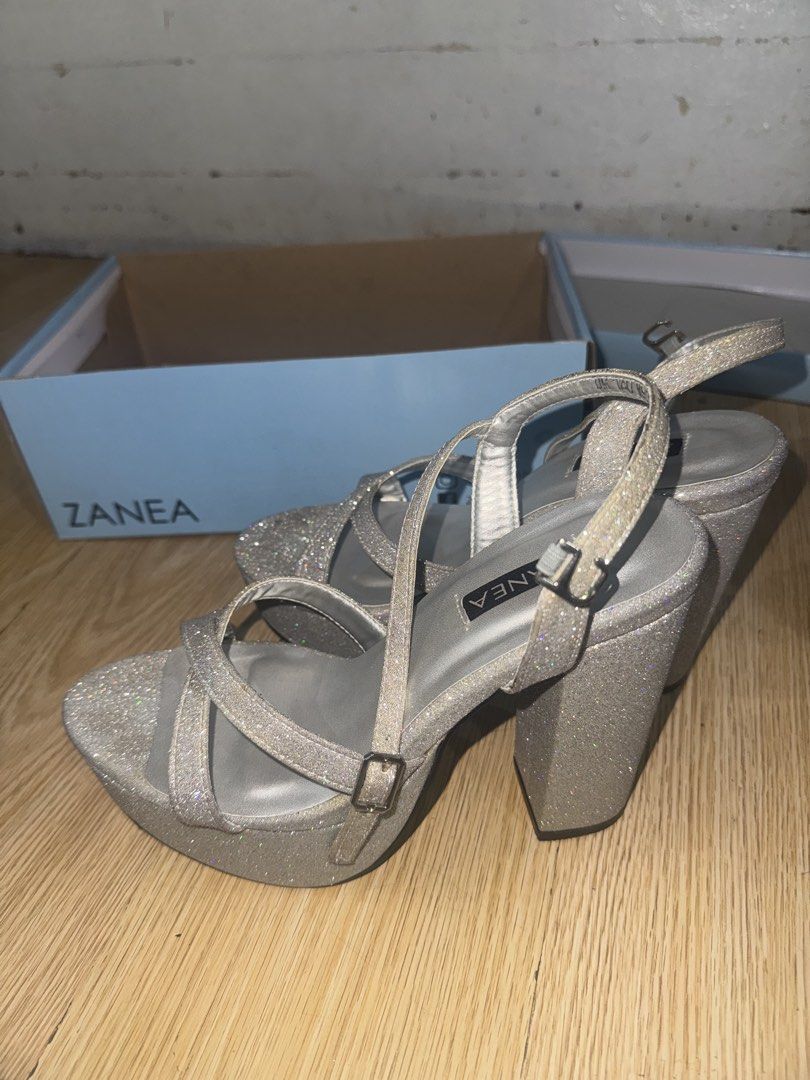 Zanea Silver Glitter Platform Block Heels (Category: Heels) located in Manila. Submitted by jaamsant (Listing ID 1462820827, Image 3). Description: 6-inch platform heels Used only once for an event Original price as seen on the photo Women’s size 40 (my usual size for sneakers is 8-9) RFS - declutterring .