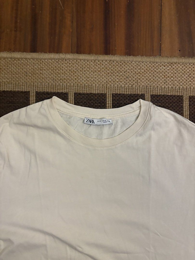 Zara Basic T-shirt Beige (Category: Tshirts & Polo Shirts ) located in Paranaque City. Submitted by max_bully014 (Listing ID 1462864285, Image 1). Description: - Brand: Zara - Color: Tan/Beige - Style: Basic T-shirt - Neckline: Crew neck - Sleeves: Short sleeves - Features: Simple, versatile, easy to pair with anything - Occasion: Everyday wear.
