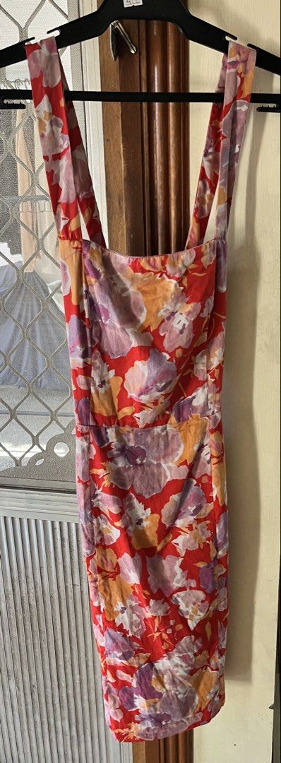 Zara dress (Category: Dresses) located in Bacoor. Submitted by ayit. (Listing ID 1462713971, Image 1). Description: - Brand: Zara - Size: Medium (EU 38 / UK 10 / US 6) - Design: Vibrant floral print with red, orange, and purple hues - Style: Perfect for casual outings or summer events - Condition: Excellent, pre-loved - Meetup Location: Citta Italia Subdivision, Bacoor, Cavite Sf inc .