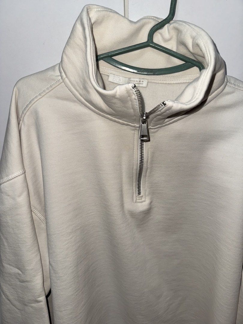 Zara Light Beige Half Zip Sweatshirt (Category: Coats, Jackets and Outerwear) located in Manila. Submitted by quintessesommerset (Listing ID 1462789409, Image 2). Description: - Zara Beige Half Zip Sweatshirt - Size: XL 24x28 - Made in Bangladesh - Comfortable and casual design - Ideal for everyday wear - Easy to style.