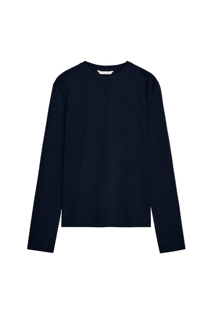 Zara Navy Blue Crew Neck Longsleeve (Category: Longsleeves) located in Binan City. Submitted by myprelovedhaul (Listing ID 1462805967, Image 1). Description: Fits xs to medium adult! The highlighted product is a plain navy blue long-sleeve crewneck t-shirt from Zara Kids..