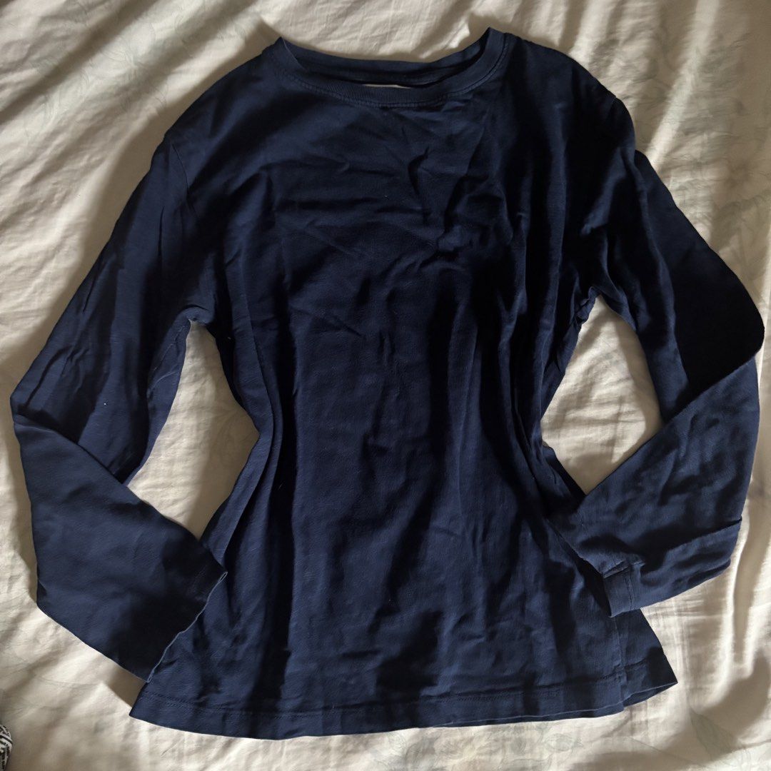 Zara Navy Blue Crew Neck Longsleeve (Category: Longsleeves) located in Binan City. Submitted by myprelovedhaul (Listing ID 1462805967, Image 2). Description: Fits xs to medium adult! The highlighted product is a plain navy blue long-sleeve crewneck t-shirt from Zara Kids..